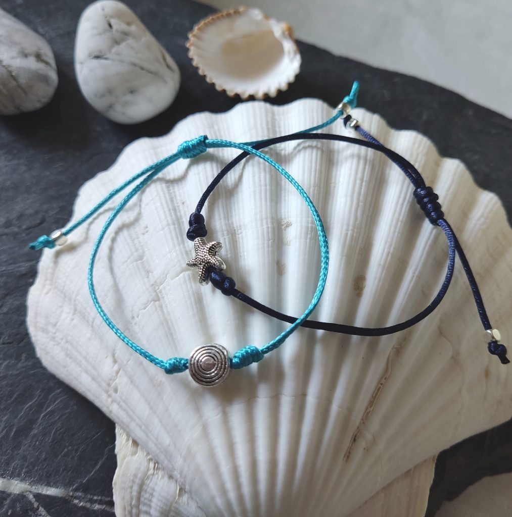 conjunto dos pulseras azules marino estrella mar